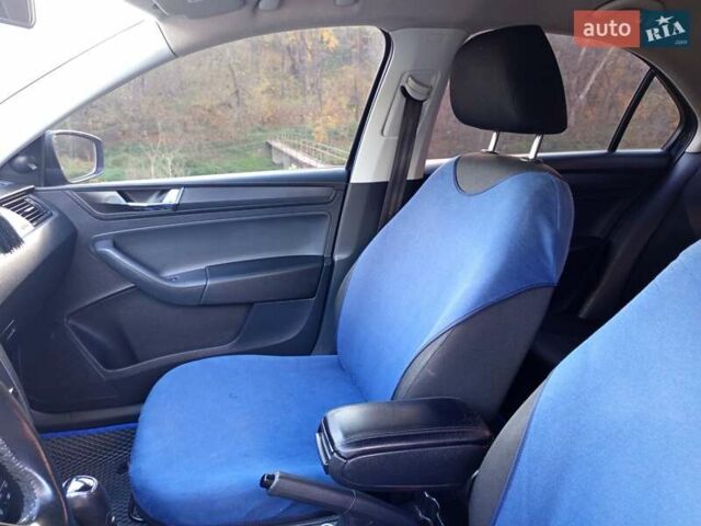 Синий Шкода Рапид, объемом двигателя 1.6 л и пробегом 221 тыс. км за 9900 $, фото 14 на Automoto.ua