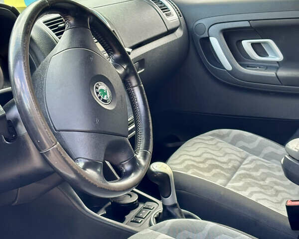 Білий Шкода Румстер, об'ємом двигуна 1.39 л та пробігом 189 тис. км за 5500 $, фото 6 на Automoto.ua