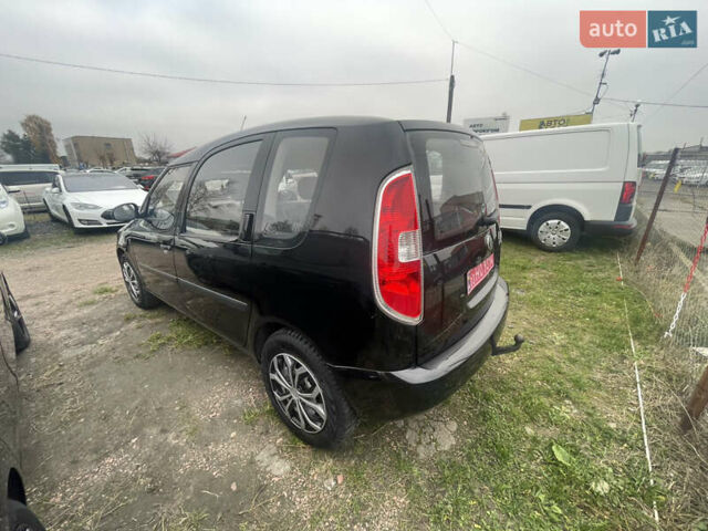 Черный Шкода Румстер, объемом двигателя 1.4 л и пробегом 222 тыс. км за 4900 $, фото 1 на Automoto.ua