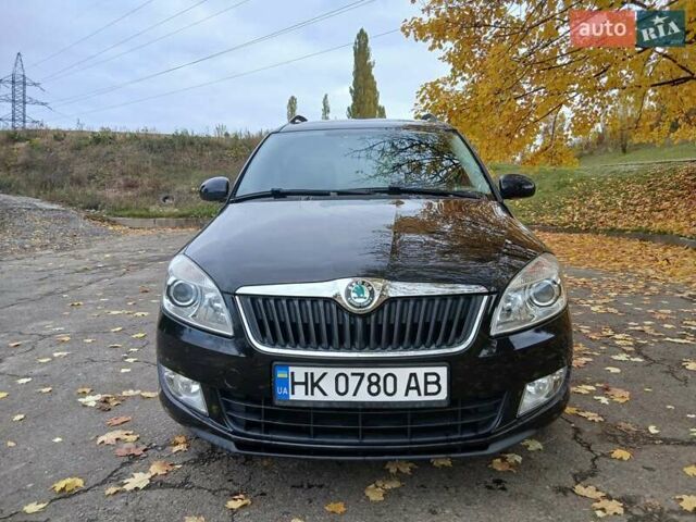 Черный Шкода Румстер, объемом двигателя 1.2 л и пробегом 219 тыс. км за 7200 $, фото 2 на Automoto.ua