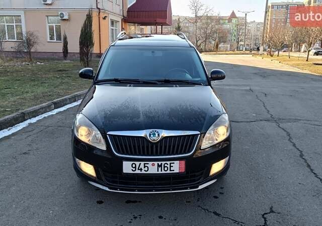 Черный Шкода Румстер, объемом двигателя 1.2 л и пробегом 215 тыс. км за 6500 $, фото 1 на Automoto.ua