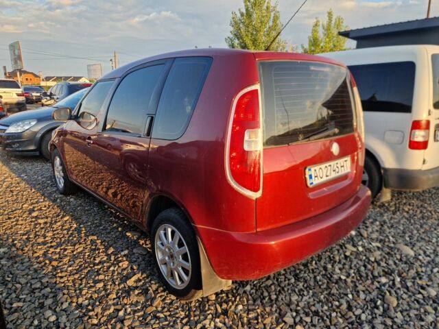 Красный Шкода Румстер, объемом двигателя 1.4 л и пробегом 288 тыс. км за 3900 $, фото 1 на Automoto.ua