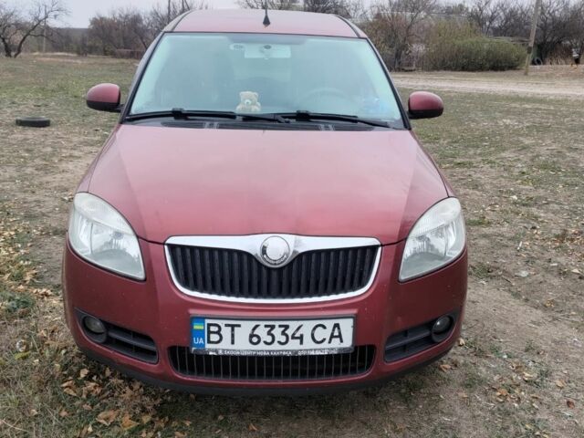 Красный Шкода Румстер, объемом двигателя 1.4 л и пробегом 326 тыс. км за 4300 $, фото 1 на Automoto.ua
