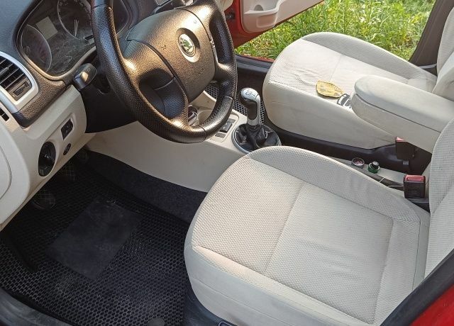 Червоний Шкода Румстер, об'ємом двигуна 1.4 л та пробігом 275 тис. км за 5000 $, фото 1 на Automoto.ua