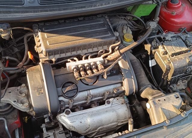 Червоний Шкода Румстер, об'ємом двигуна 1.4 л та пробігом 275 тис. км за 5000 $, фото 5 на Automoto.ua