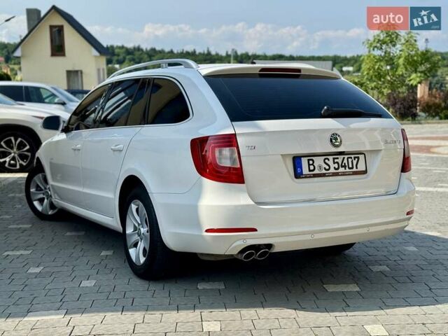 Білий Шкода Суперб, об'ємом двигуна 2 л та пробігом 305 тис. км за 9350 $, фото 45 на Automoto.ua