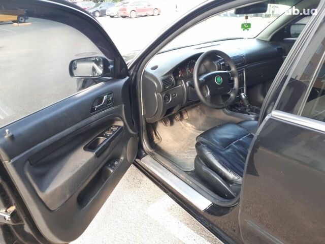 Черный Шкода Суперб, объемом двигателя 1.8 л и пробегом 498 тыс. км за 4500 $, фото 6 на Automoto.ua