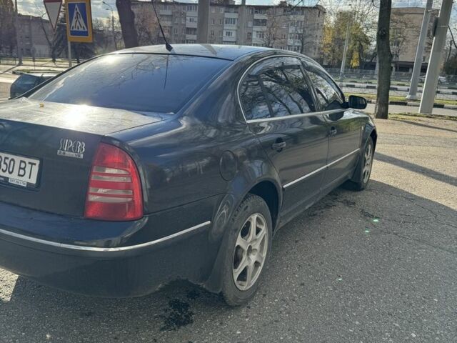 Черный Шкода Суперб, объемом двигателя 2.8 л и пробегом 350 тыс. км за 4200 $, фото 10 на Automoto.ua