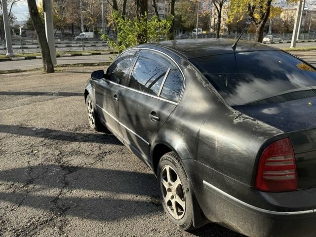 Черный Шкода Суперб, объемом двигателя 2.8 л и пробегом 350 тыс. км за 4200 $, фото 5 на Automoto.ua