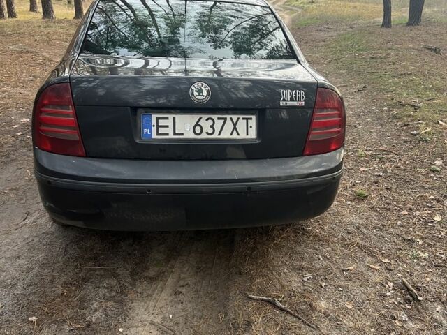 Черный Шкода Суперб, объемом двигателя 1.9 л и пробегом 320 тыс. км за 2850 $, фото 7 на Automoto.ua