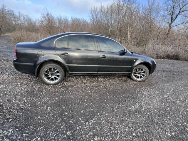 Черный Шкода Суперб, объемом двигателя 1.8 л и пробегом 220 тыс. км за 5100 $, фото 2 на Automoto.ua