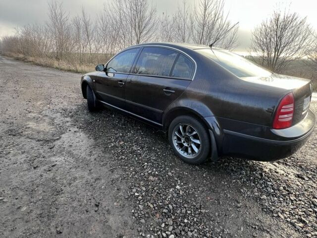 Черный Шкода Суперб, объемом двигателя 1.8 л и пробегом 220 тыс. км за 5100 $, фото 5 на Automoto.ua