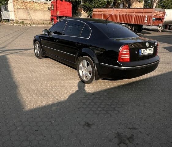 Черный Шкода Суперб, объемом двигателя 2.5 л и пробегом 340 тыс. км за 2039 $, фото 4 на Automoto.ua