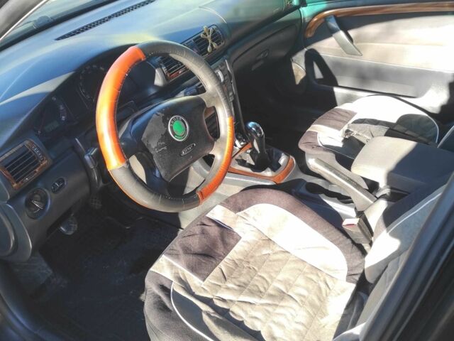 Черный Шкода Суперб, объемом двигателя 1.8 л и пробегом 320 тыс. км за 3500 $, фото 11 на Automoto.ua