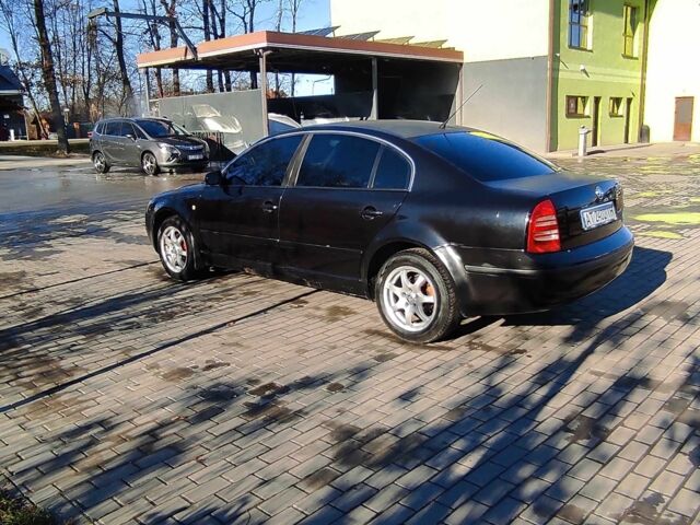 Черный Шкода Суперб, объемом двигателя 1.8 л и пробегом 320 тыс. км за 3500 $, фото 7 на Automoto.ua