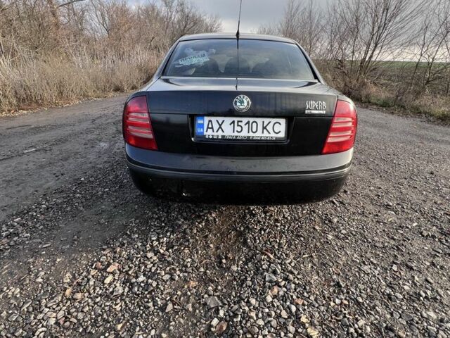 Черный Шкода Суперб, объемом двигателя 1.8 л и пробегом 220 тыс. км за 5100 $, фото 1 на Automoto.ua