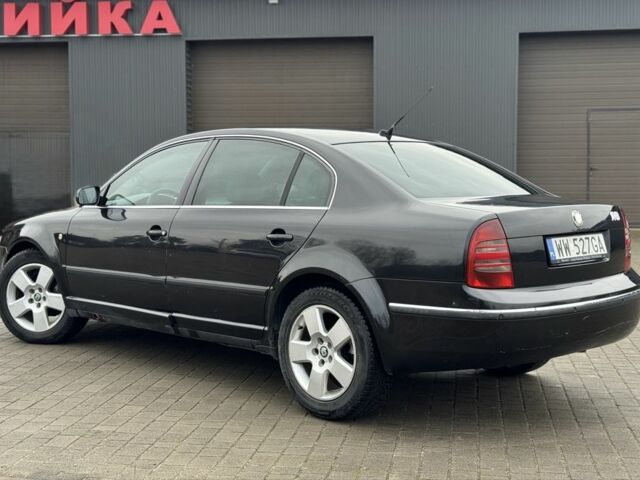 Черный Шкода Суперб, объемом двигателя 1.9 л и пробегом 397 тыс. км за 2450 $, фото 6 на Automoto.ua