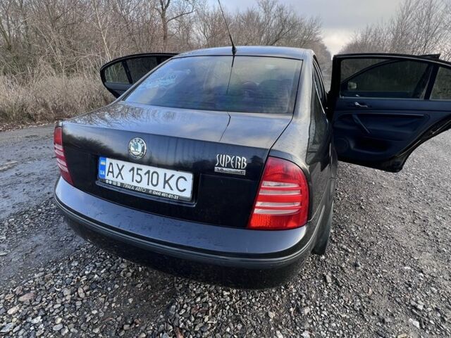 Черный Шкода Суперб, объемом двигателя 1.8 л и пробегом 220 тыс. км за 5100 $, фото 7 на Automoto.ua