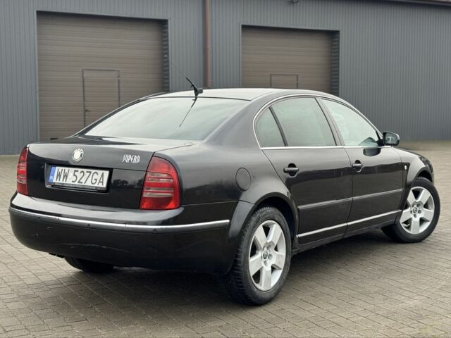 Черный Шкода Суперб, объемом двигателя 1.9 л и пробегом 397 тыс. км за 2450 $, фото 5 на Automoto.ua