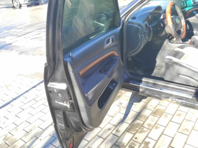 Черный Шкода Суперб, объемом двигателя 1.8 л и пробегом 320 тыс. км за 3500 $, фото 17 на Automoto.ua