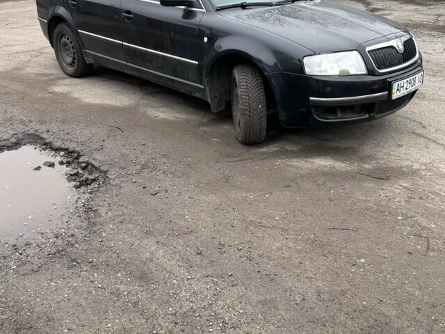 Черный Шкода Суперб, объемом двигателя 2.5 л и пробегом 100 тыс. км за 2200 $, фото 3 на Automoto.ua