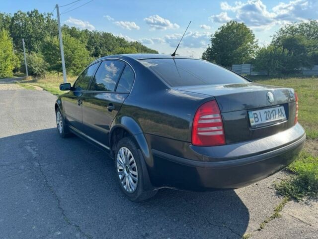 Черный Шкода Суперб, объемом двигателя 1.8 л и пробегом 330 тыс. км за 4400 $, фото 6 на Automoto.ua