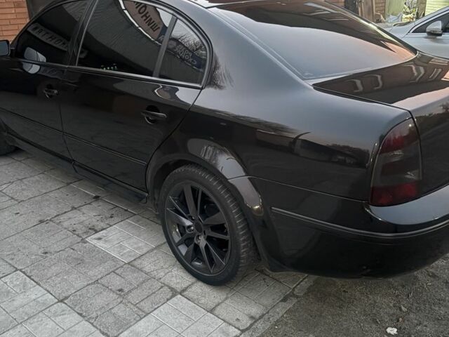 Черный Шкода Суперб, объемом двигателя 1.8 л и пробегом 325 тыс. км за 7399 $, фото 12 на Automoto.ua