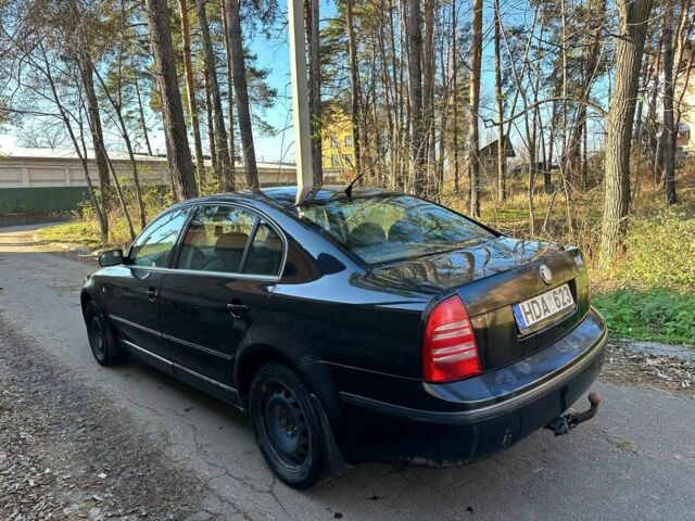 Черный Шкода Суперб, объемом двигателя 1.9 л и пробегом 357 тыс. км за 1700 $, фото 1 на Automoto.ua