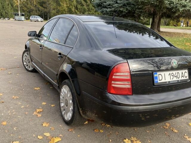 Черный Шкода Суперб, объемом двигателя 1.8 л и пробегом 400 тыс. км за 2700 $, фото 2 на Automoto.ua