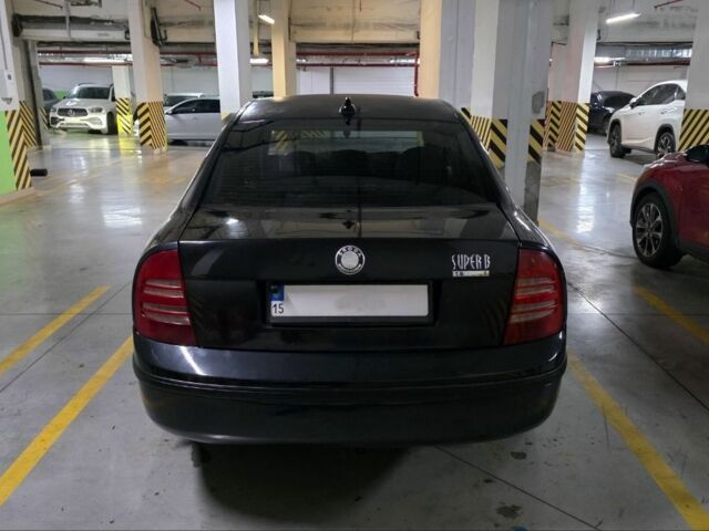 Черный Шкода Суперб, объемом двигателя 1.8 л и пробегом 257 тыс. км за 4499 $, фото 17 на Automoto.ua