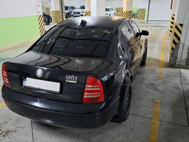 Черный Шкода Суперб, объемом двигателя 1.8 л и пробегом 257 тыс. км за 4499 $, фото 2 на Automoto.ua