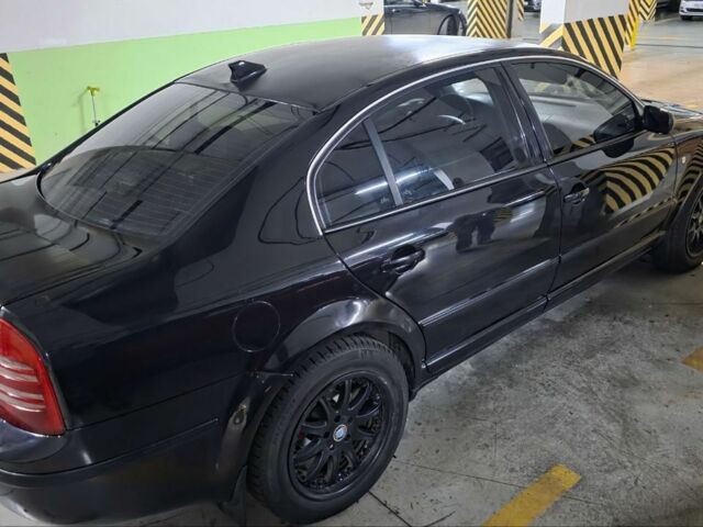 Черный Шкода Суперб, объемом двигателя 1.8 л и пробегом 257 тыс. км за 4499 $, фото 1 на Automoto.ua