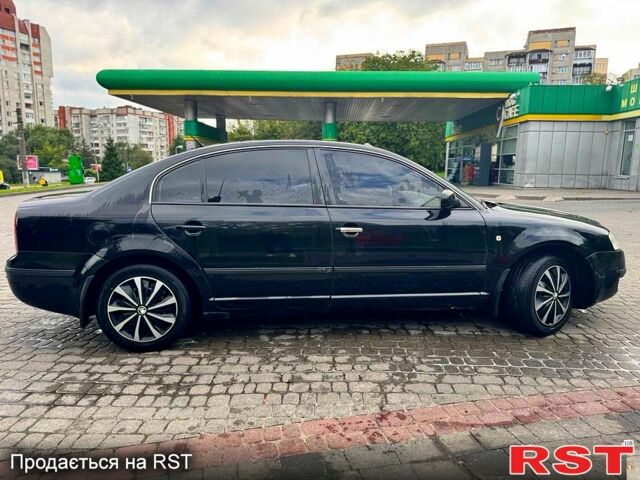 Черный Шкода Суперб, объемом двигателя 1.8 л и пробегом 210 тыс. км за 4300 $, фото 1 на Automoto.ua