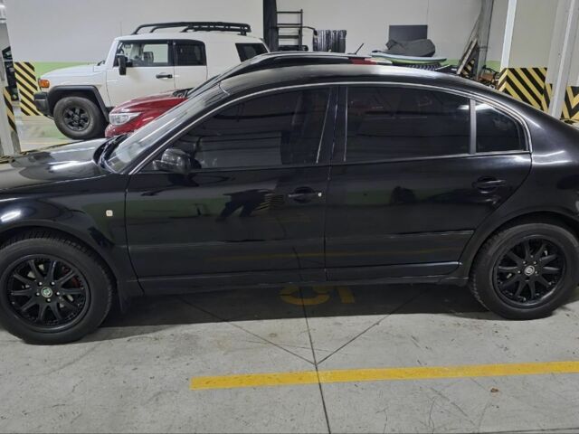 Черный Шкода Суперб, объемом двигателя 1.8 л и пробегом 257 тыс. км за 4499 $, фото 16 на Automoto.ua