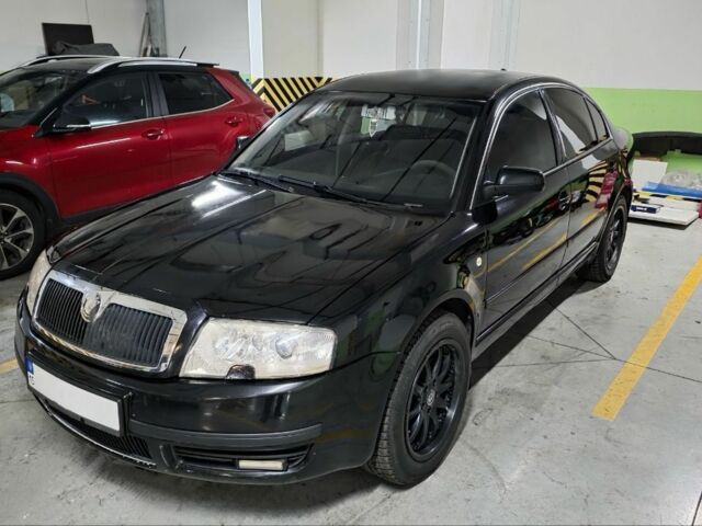 Черный Шкода Суперб, объемом двигателя 1.8 л и пробегом 257 тыс. км за 4499 $, фото 14 на Automoto.ua