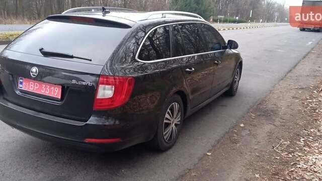 Черный Шкода Суперб, объемом двигателя 2 л и пробегом 240 тыс. км за 10900 $, фото 1 на Automoto.ua