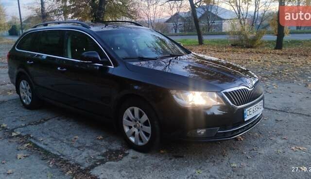 Шкода Суперб 2013 у Кицмане на Automoto.ua Чорний Шкода Суперб, об'ємом двигуна 2 л та пробігом 235 тис. км за 13400 $, фото 31 на Automoto.ua