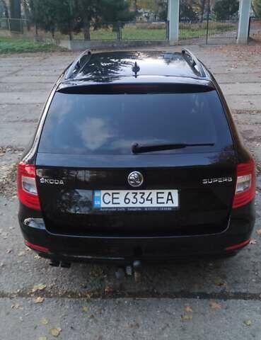 Шкода Суперб 2013 у Кицмане на Automoto.ua Чорний Шкода Суперб, об'ємом двигуна 2 л та пробігом 235 тис. км за 13400 $, фото 7 на Automoto.ua