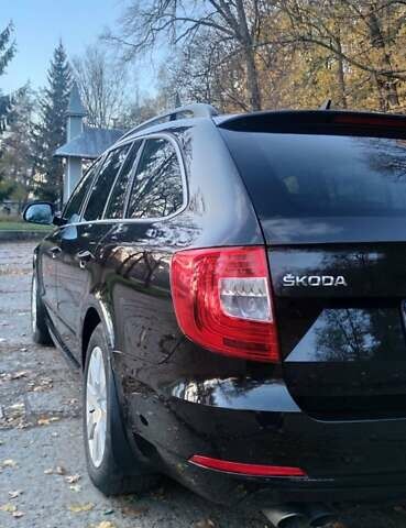 Шкода Суперб 2013 у Кицмане на Automoto.ua Чорний Шкода Суперб, об'ємом двигуна 2 л та пробігом 235 тис. км за 13400 $, фото 8 на Automoto.ua