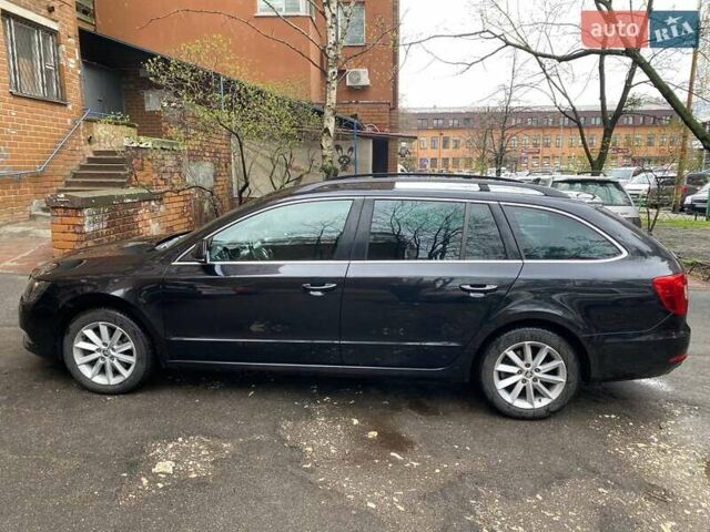 Черный Шкода Суперб, объемом двигателя 1.97 л и пробегом 234 тыс. км за 14000 $, фото 1 на Automoto.ua