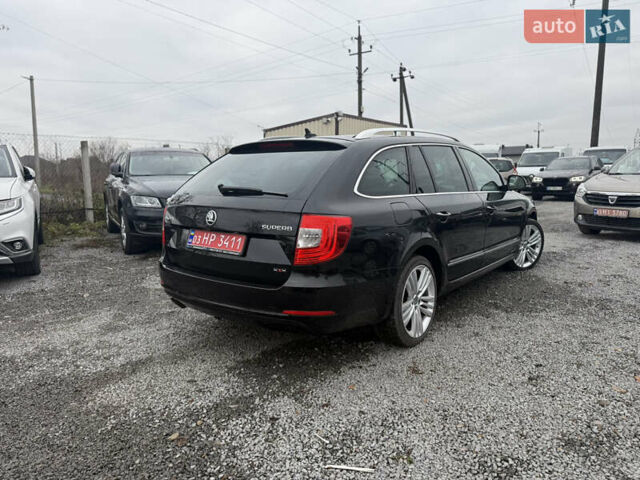 Черный Шкода Суперб, объемом двигателя 2 л и пробегом 235 тыс. км за 15500 $, фото 3 на Automoto.ua