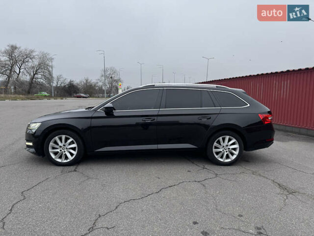 Черный Шкода Суперб, объемом двигателя 1.98 л и пробегом 223 тыс. км за 18900 $, фото 1 на Automoto.ua