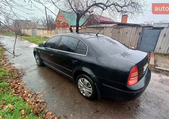 Черный Шкода Суперб, объемом двигателя 2.77 л и пробегом 287 тыс. км за 3800 $, фото 2 на Automoto.ua