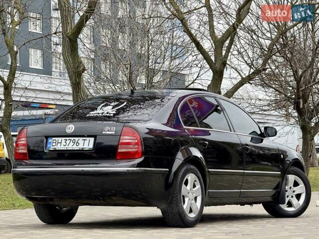 Черный Шкода Суперб, объемом двигателя 2.8 л и пробегом 298 тыс. км за 3600 $, фото 15 на Automoto.ua