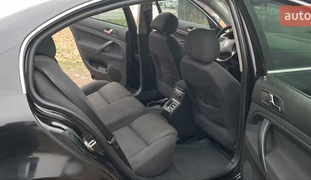 Черный Шкода Суперб, объемом двигателя 1.8 л и пробегом 302 тыс. км за 4500 $, фото 12 на Automoto.ua