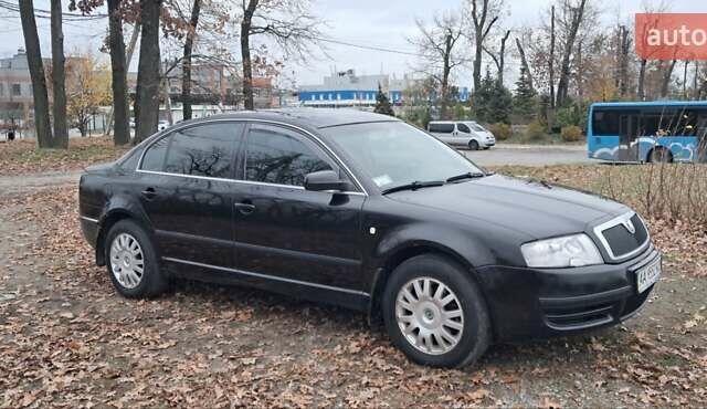 Черный Шкода Суперб, объемом двигателя 1.8 л и пробегом 302 тыс. км за 4500 $, фото 5 на Automoto.ua