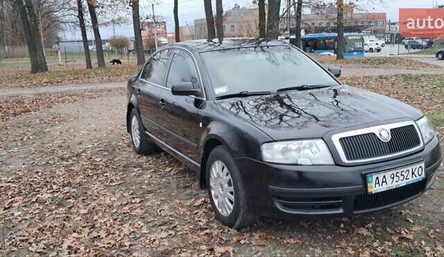 Черный Шкода Суперб, объемом двигателя 1.8 л и пробегом 302 тыс. км за 4500 $, фото 1 на Automoto.ua
