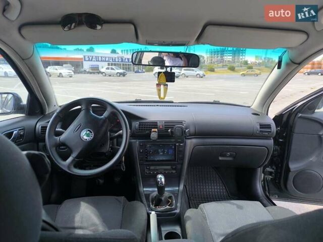 Черный Шкода Суперб, объемом двигателя 1.9 л и пробегом 318 тыс. км за 4450 $, фото 1 на Automoto.ua