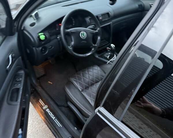 Черный Шкода Суперб, объемом двигателя 1.9 л и пробегом 503 тыс. км за 4500 $, фото 11 на Automoto.ua