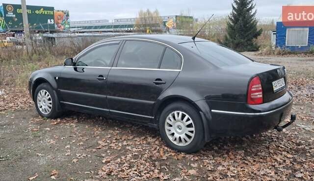 Черный Шкода Суперб, объемом двигателя 1.8 л и пробегом 302 тыс. км за 4500 $, фото 8 на Automoto.ua